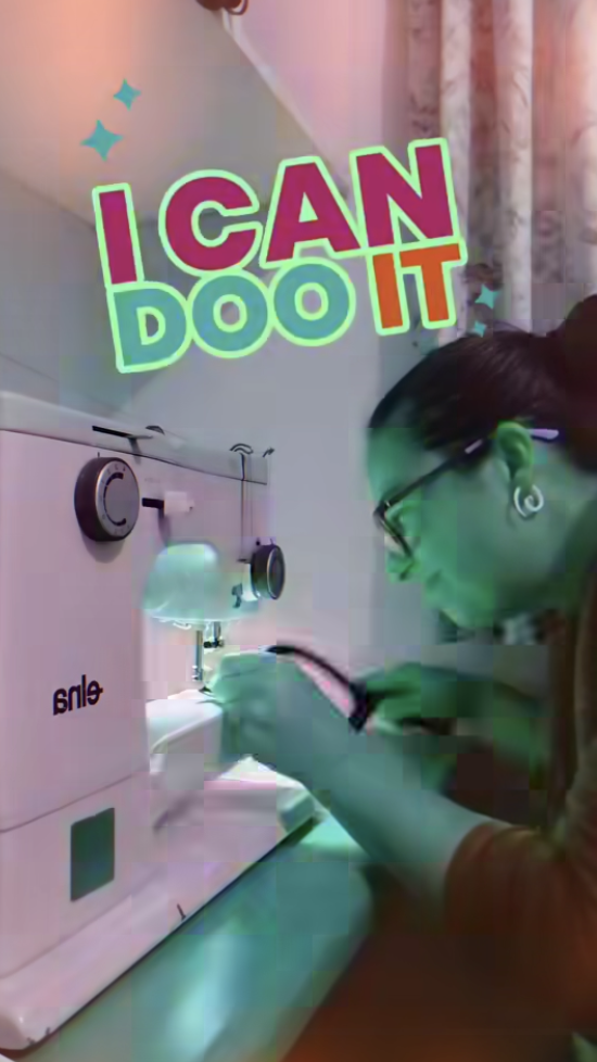 Maryann working at a sewing machine